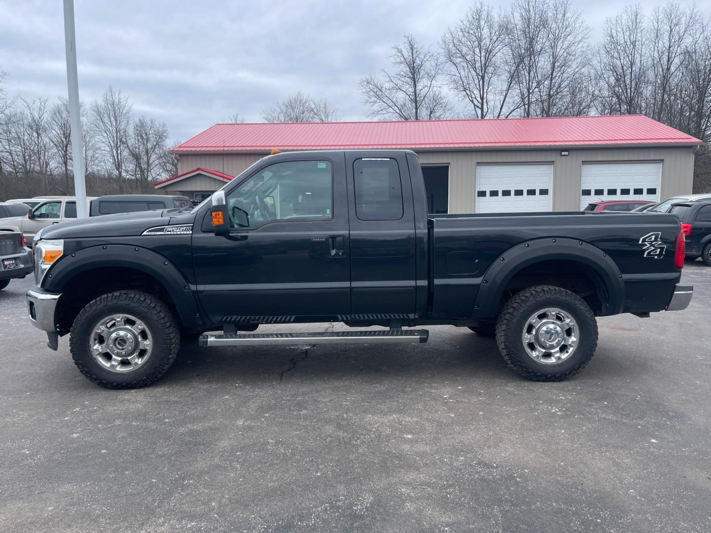 2015 Black /Black Ford F-250 SD Lariat SuperCab Long Bed 4WD (1FT7X2B63FE) with an 6.2L V8 OHV 16V FFV engine, 6-Speed Automatic transmission, located at 547 E. Main St., Orwell, OH, 44076, (440) 437-5893, 41.535435, -80.847855 - Photo#30